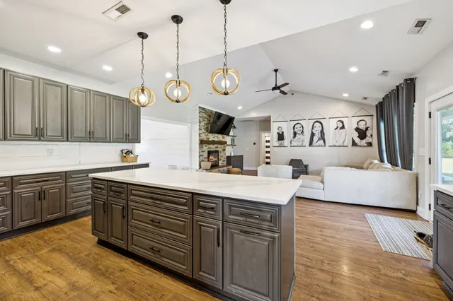 a living room with a couch and a window