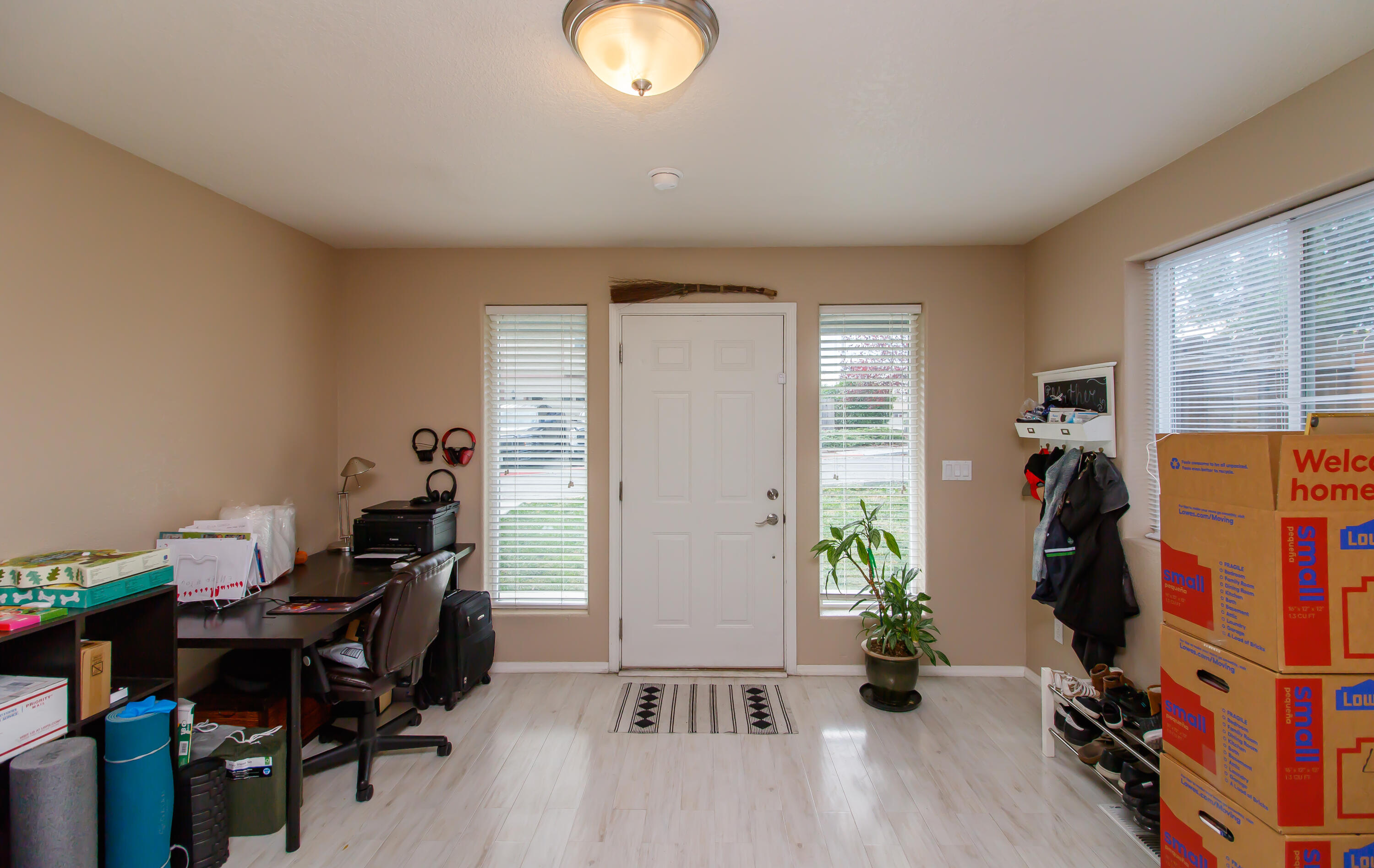607 Shadow Way Central Point, OR 97502 - Photo 2 of 28 a view of a workspace with furniture and bedroom