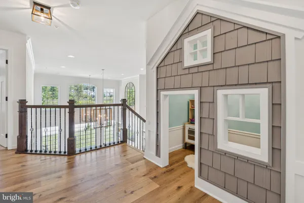 a view of a house with wooden floor and windows