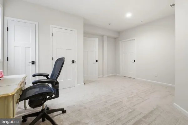 a view of workspace with lounge chair