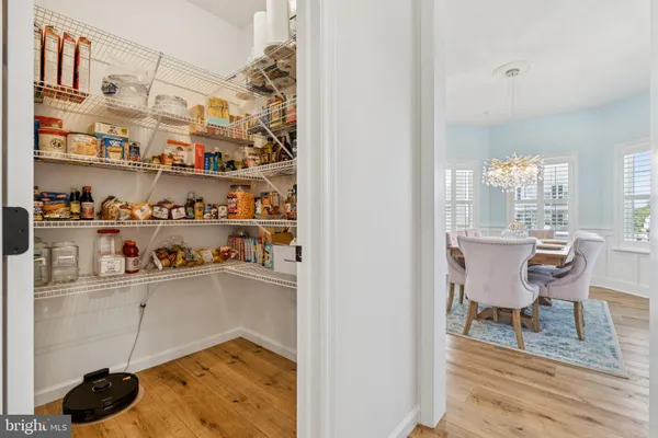 a view of a kitchen and dining room
