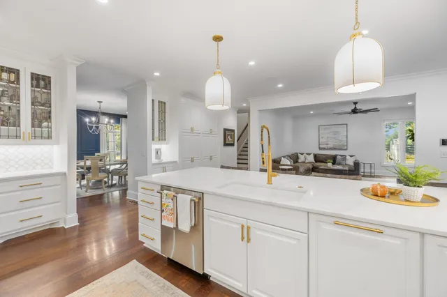 a bed room with a bed and a chair