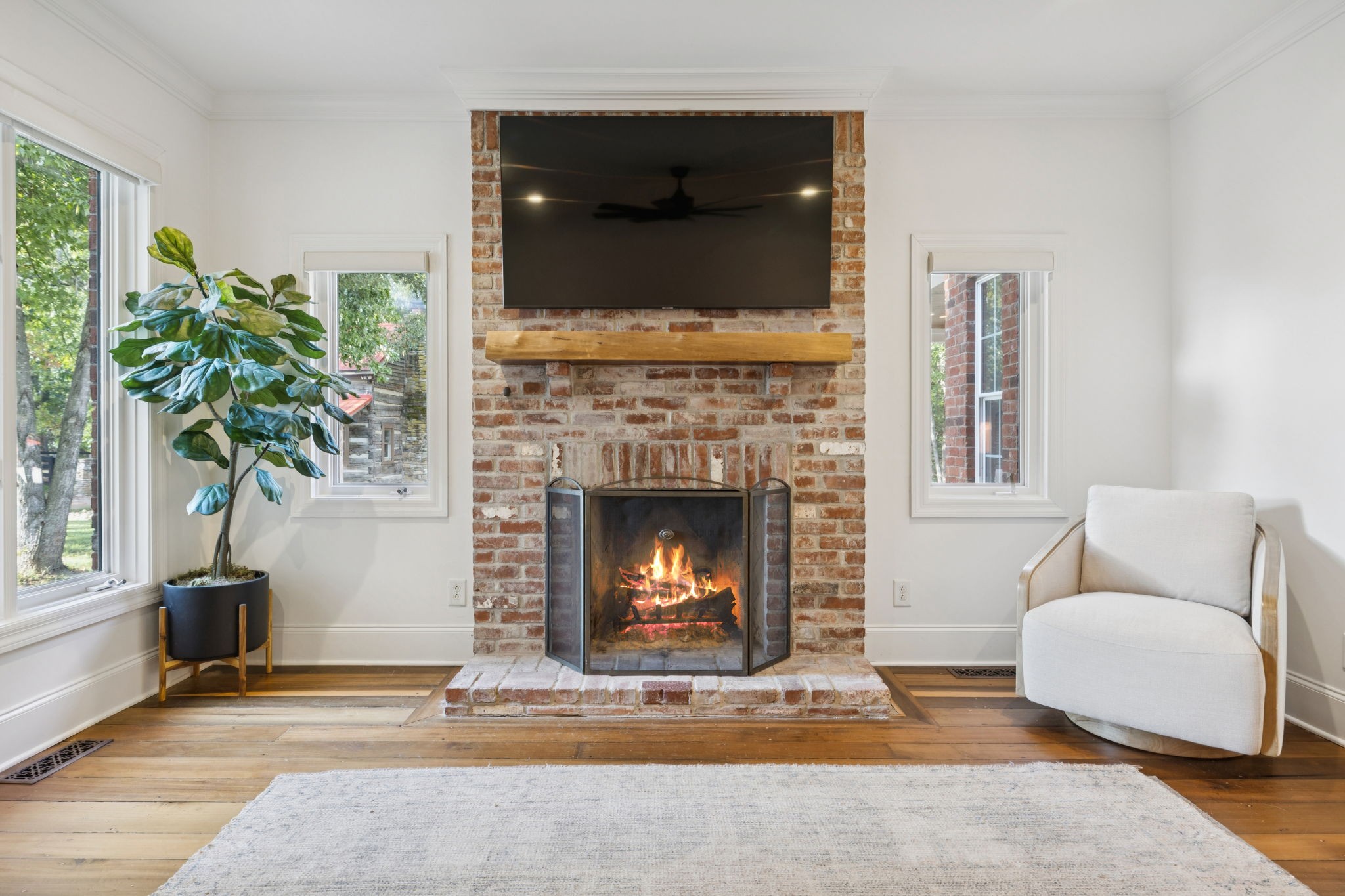 4420 Shores Road Murfreesboro, TN 37128 - Photo 18 of 89 a living room with furniture and a fireplace