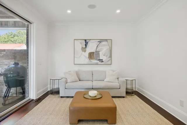 a bedroom with a bed and a table