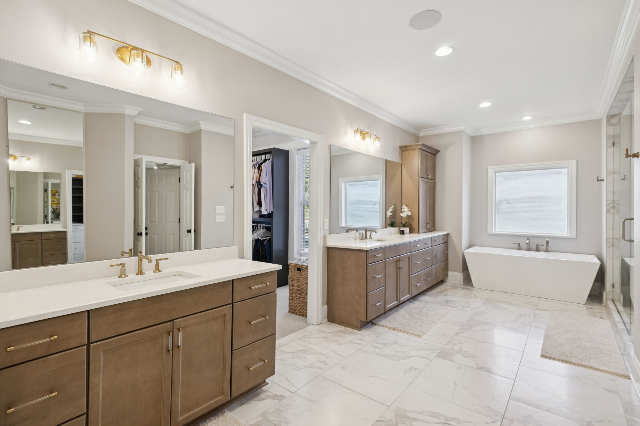 4420 Shores Road Murfreesboro, TN 37128 - Photo 28 of 89 a spacious bathroom with a double vanity sink a bathtub and mirror