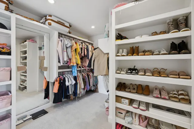 an aerial view of houses with yard