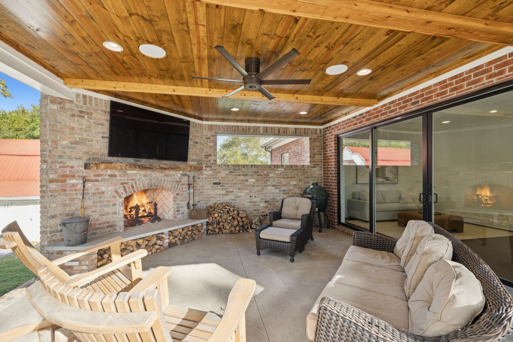 4420 Shores Road Murfreesboro, TN 37128 - Photo 62 of 89 a living room with furniture a flat screen tv and a fireplace
