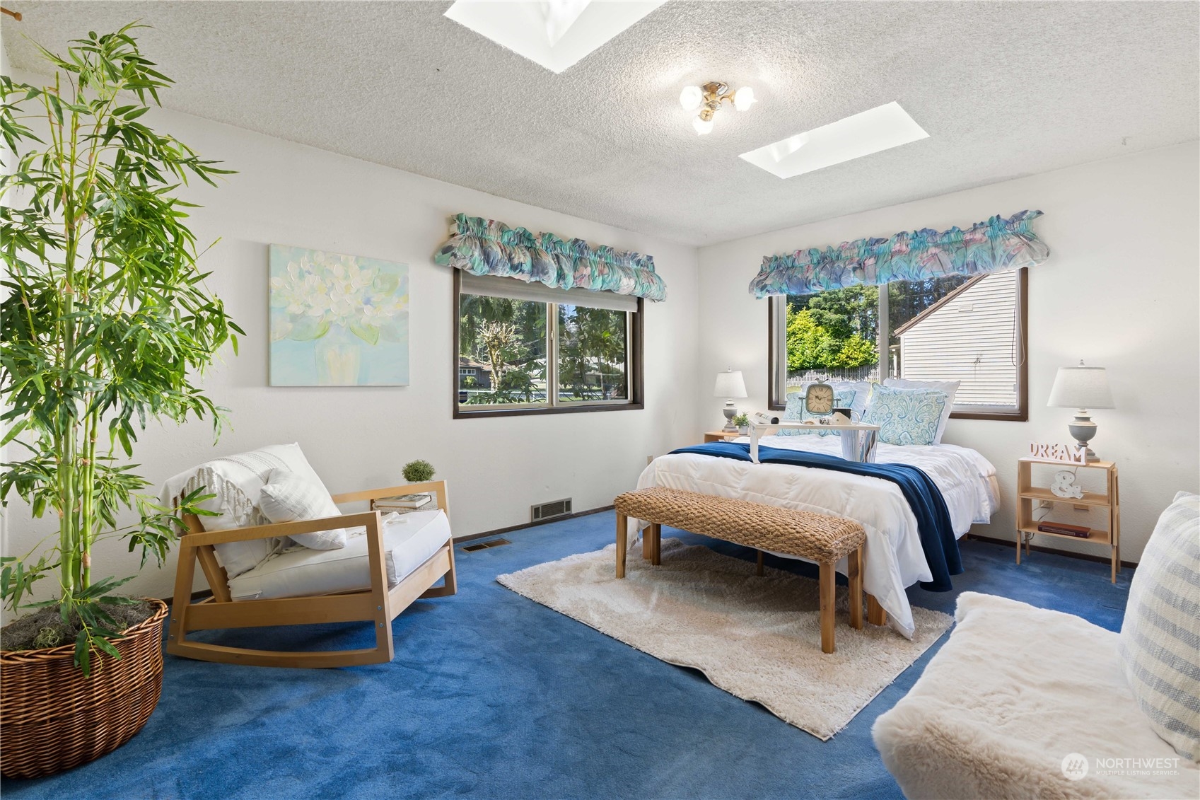 11801 Silver Way Everett, WA 98208 - Photo 12 of 32 a bedroom with furniture and a potted plant