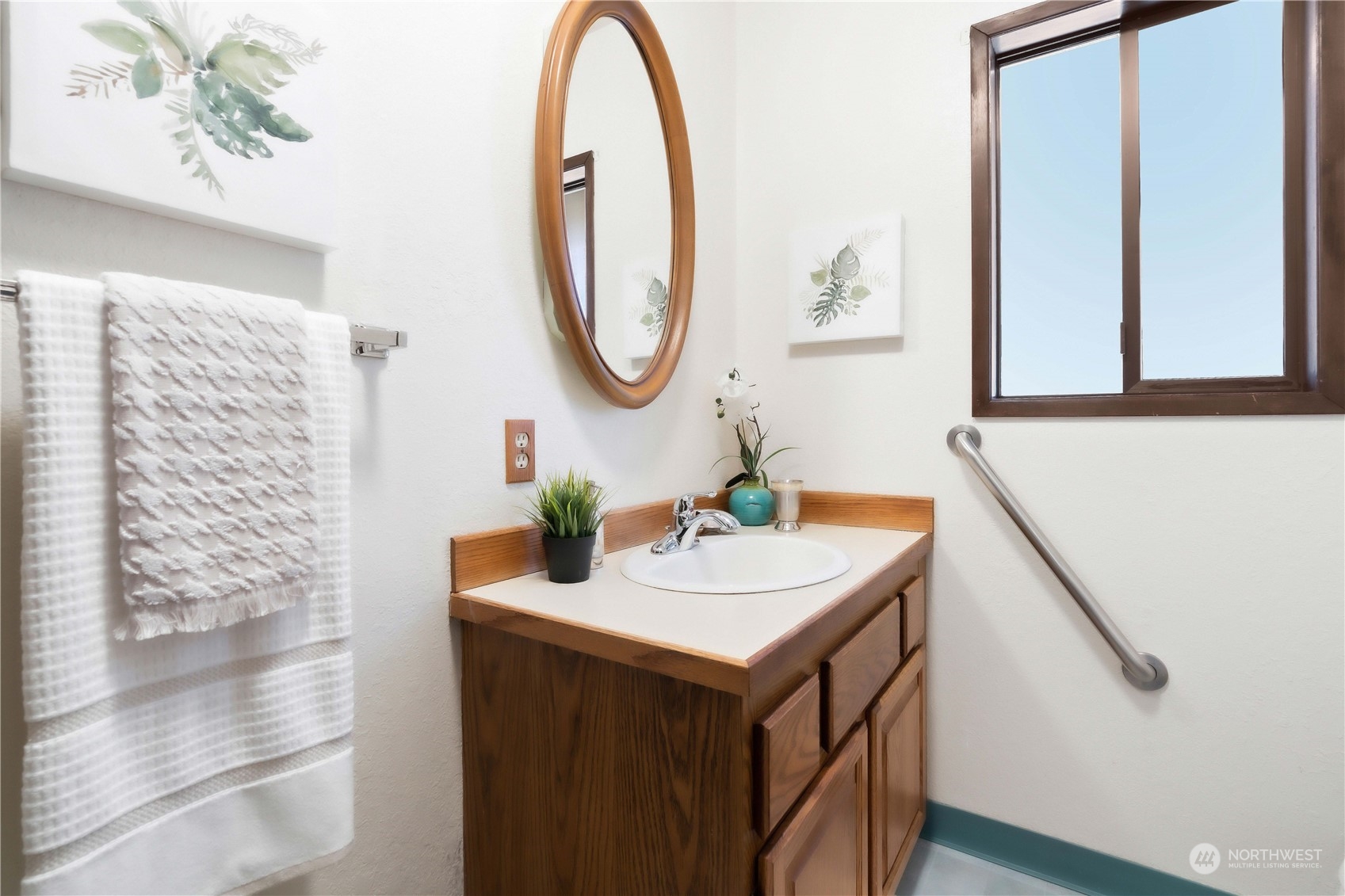 11801 Silver Way Everett, WA 98208 - Photo 18 of 32 a bathroom with a sink and a mirror