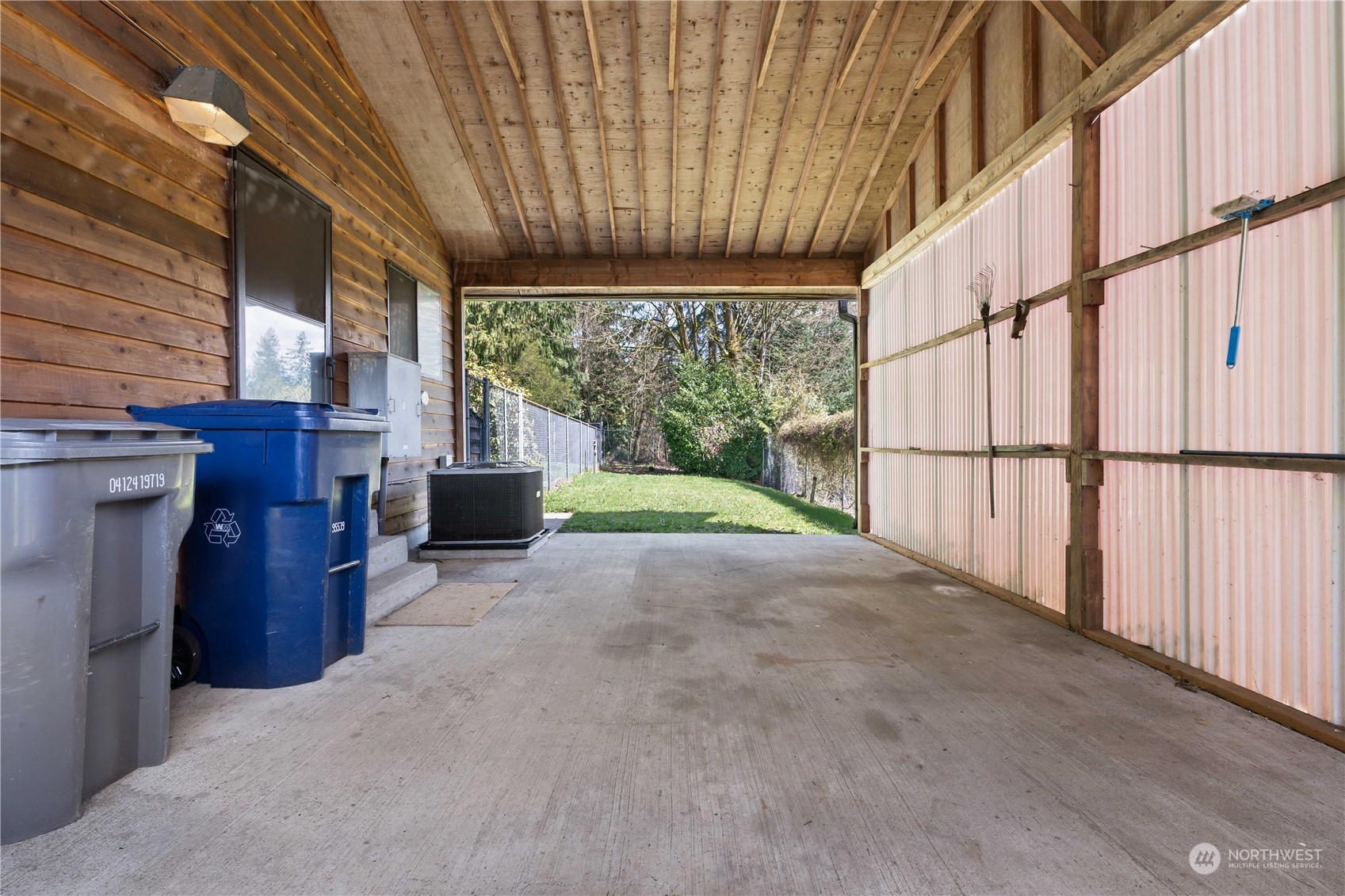 11801 Silver Way Everett, WA 98208 - Photo 21 of 32 a view of backyard with porch and outdoor kitchen