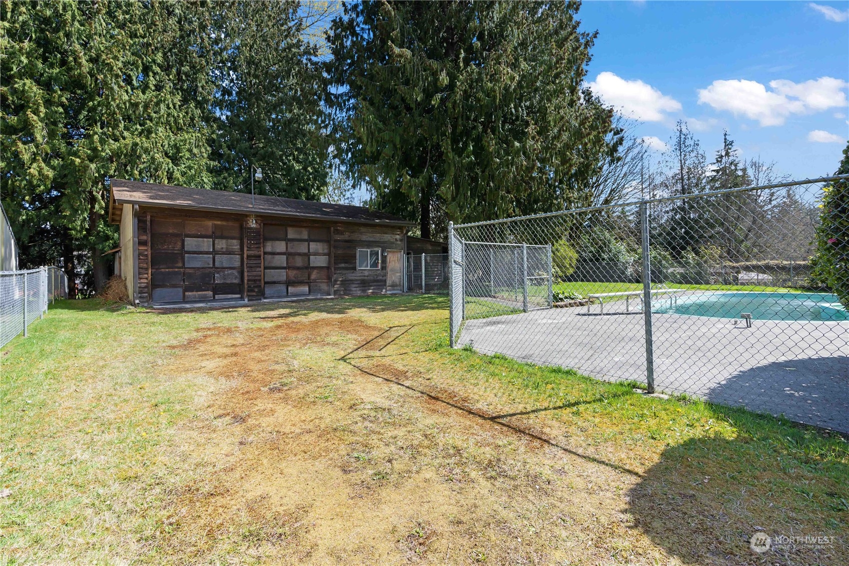 11801 Silver Way Everett, WA 98208 - Photo 23 of 32 a view of a backyard with wooden fence