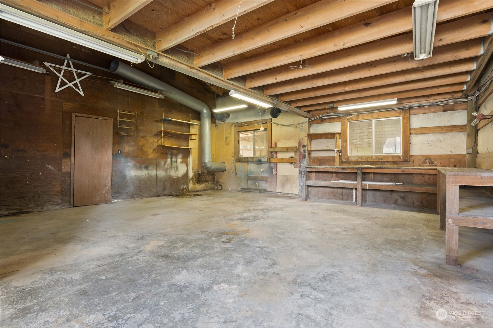 11801 Silver Way Everett, WA 98208 - Photo 24 of 32 a view of an empty room with a fireplace