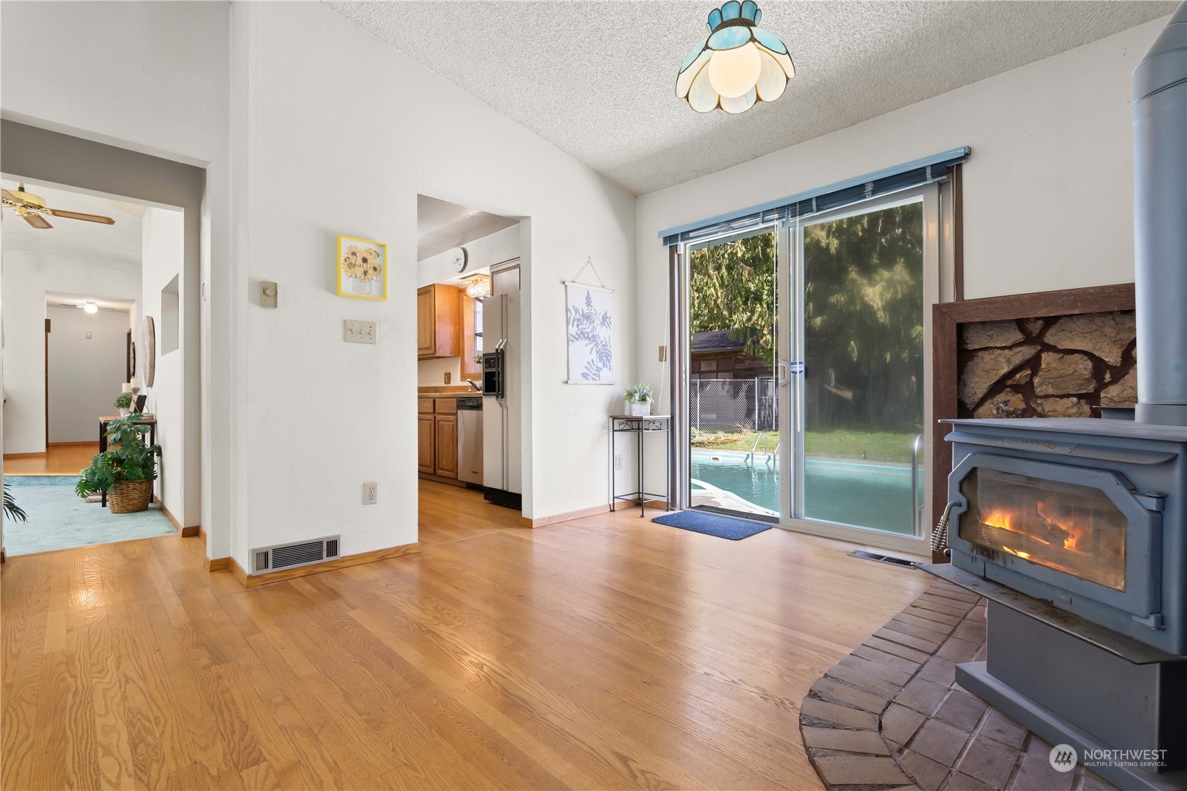 11801 Silver Way Everett, WA 98208 - Photo 9 of 32 a view of an empty room with furniture and a fireplace