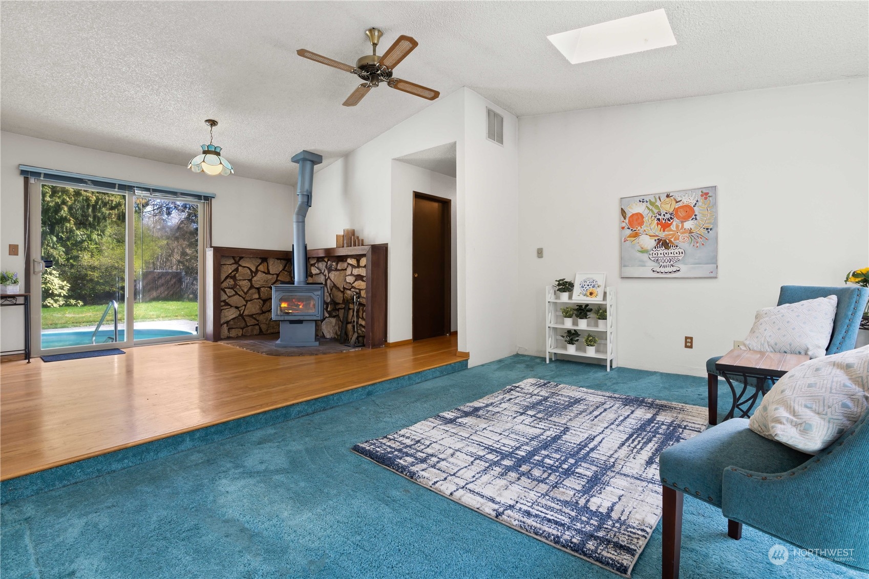 11801 Silver Way Everett, WA 98208 - Photo 10 of 32 a living room with furniture and a rug
