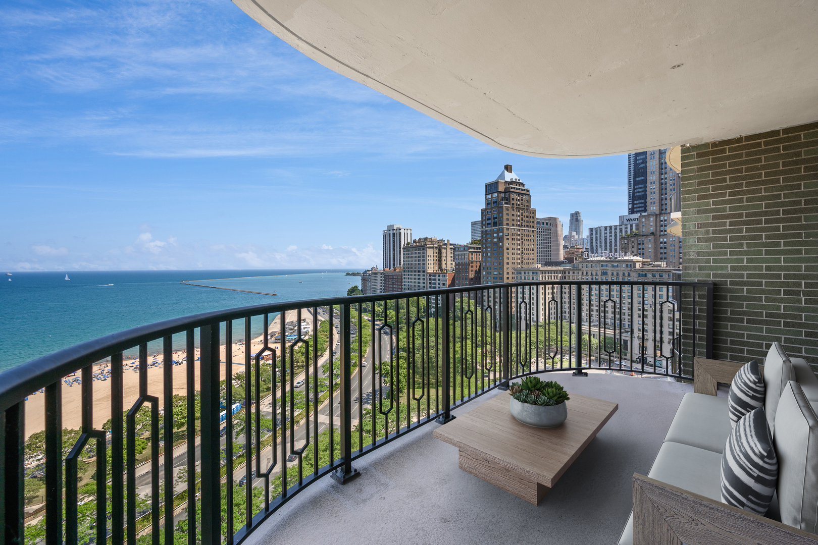 1040 North Lake Shore Drive, Unit 17D Chicago, IL 60611 - Photo 10 of 27 a view of a balcony with wooden floor