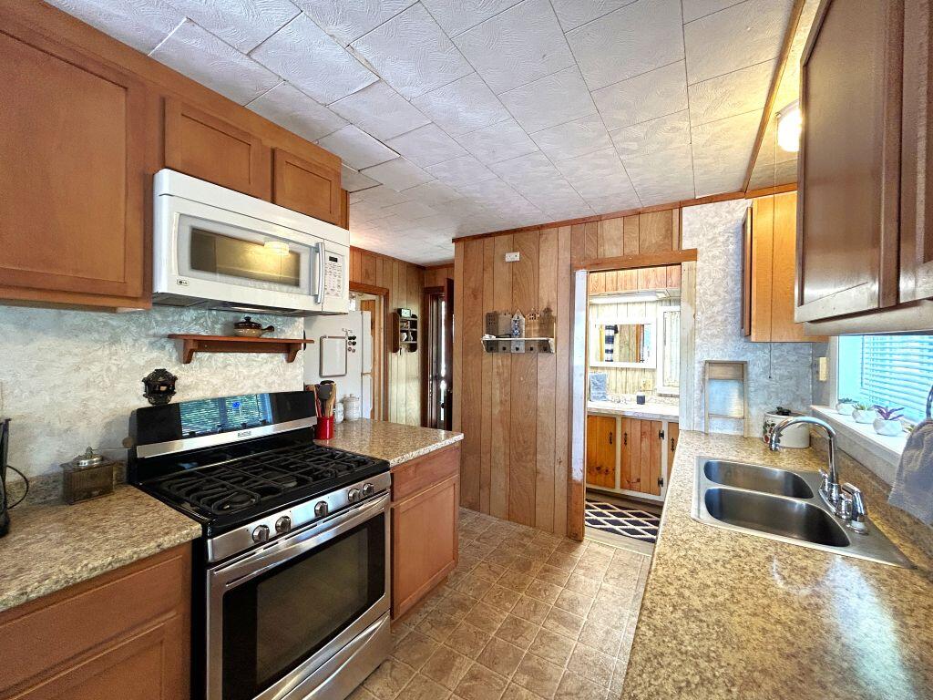 100 Spearin Shores Road Albion, ME 04910 - Photo 16 of 26 Kitchen to bath