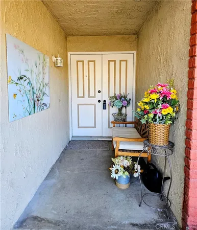 a room with toys and flowers