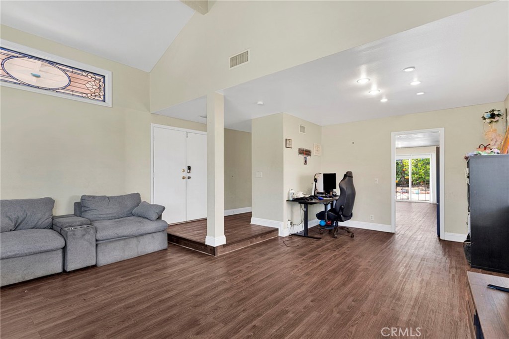 1087 Baseline Road La Verne, CA 91750 - Photo 8 of 39 a living room with furniture gym equipment and a view of living room
