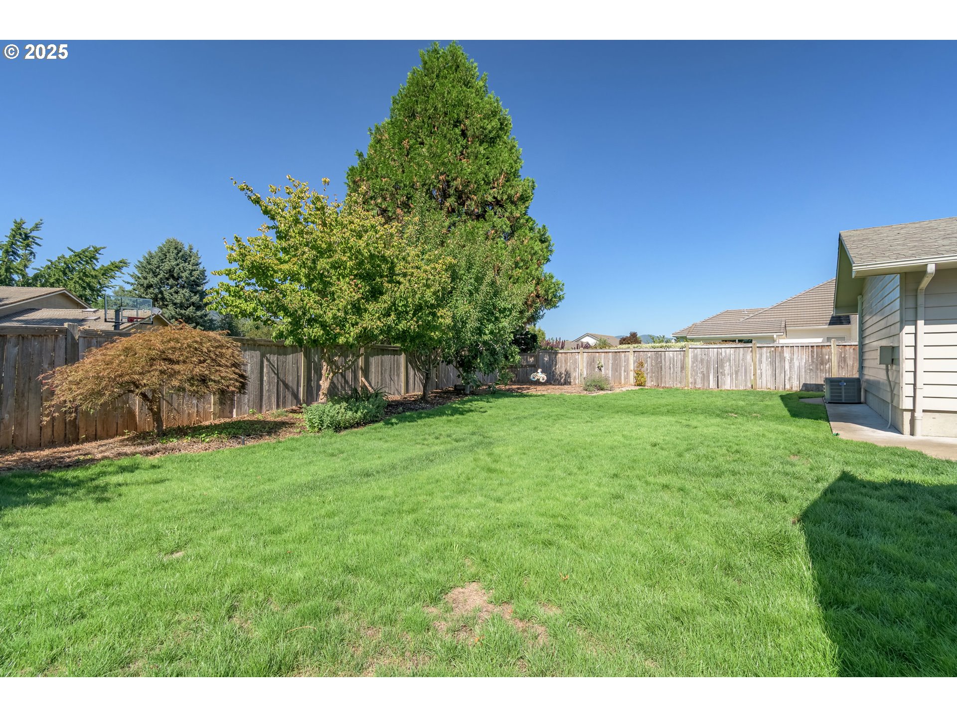 708 Blackstone Street Springfield, OR 97477 - Photo 35 of 45 a view of a house with a yard
