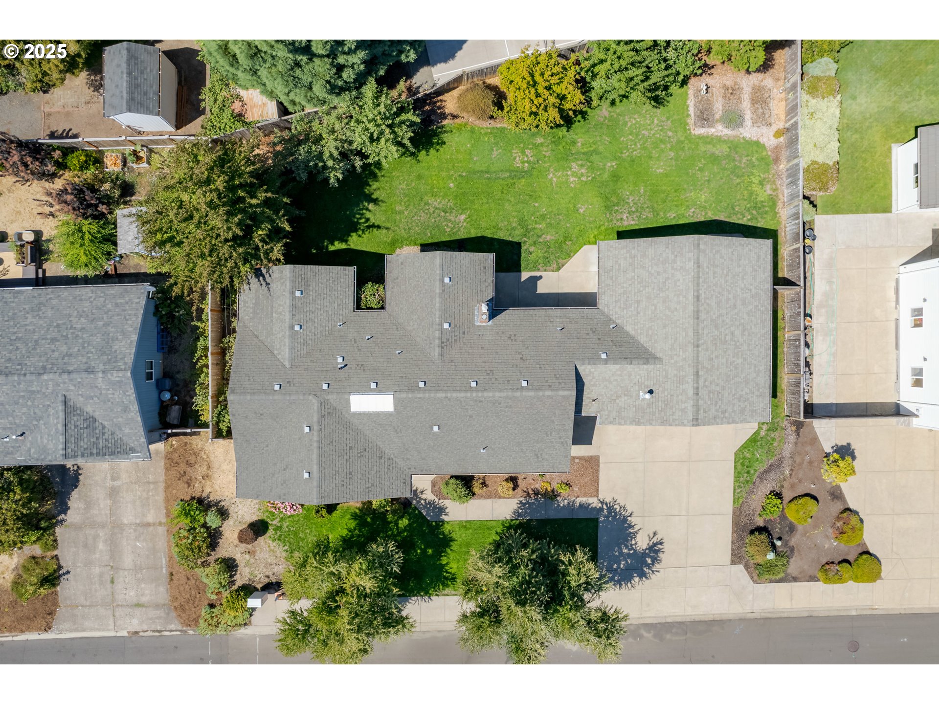 708 Blackstone Street Springfield, OR 97477 - Photo 42 of 45 an aerial view of a house with a yard