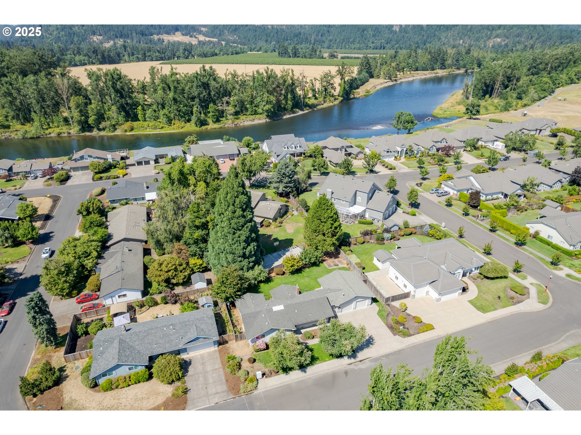 708 Blackstone Street Springfield, OR 97477 - Photo 43 of 45 an aerial view of lake residential house with outdoor space and trees