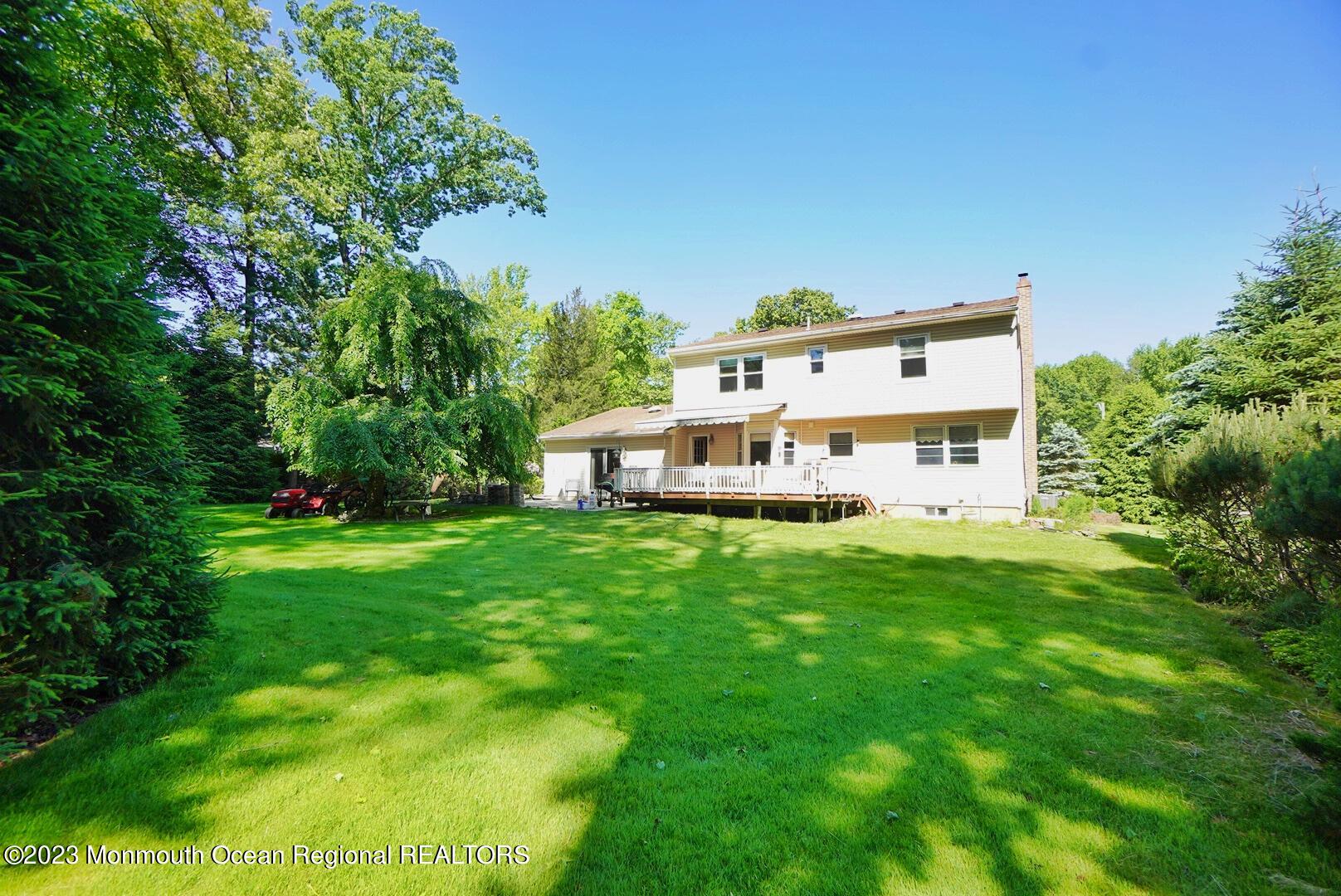 11 Grant Road Manalapan, NJ 07726 - Photo 5 of 26 PARKLIKE SETTING