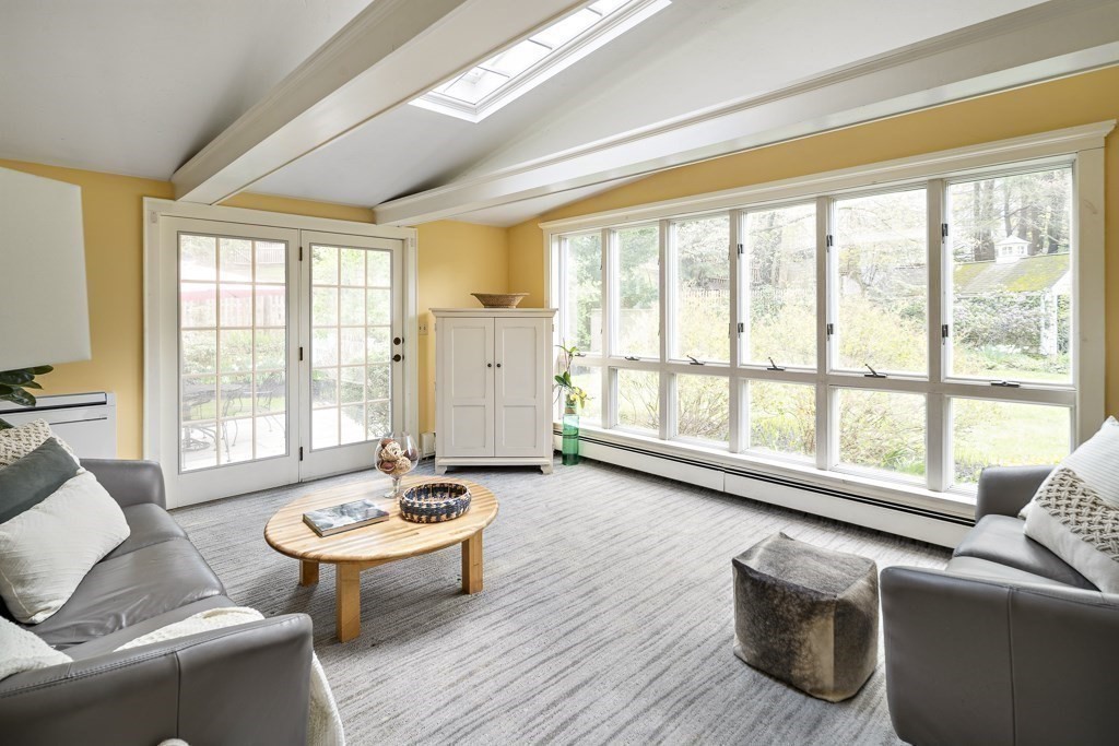 20 Stowell Road Winchester, MA 01890 - Photo 11 of 34 a living room with furniture and a large window