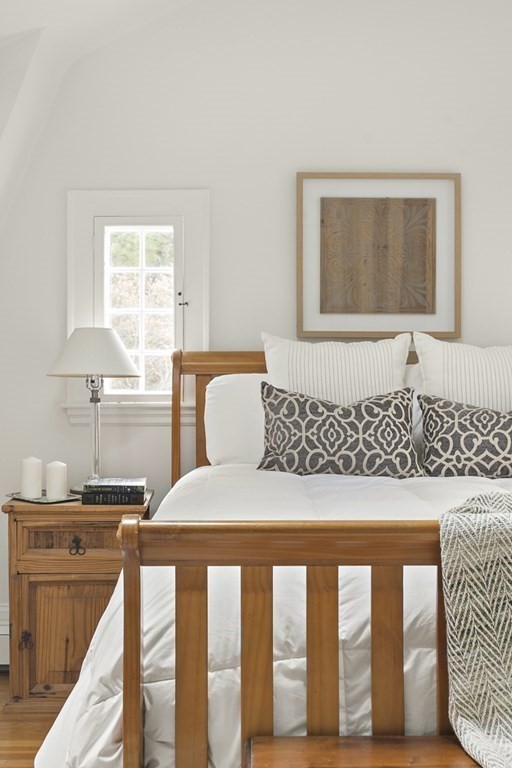 20 Stowell Road Winchester, MA 01890 - Photo 22 of 34 a bedroom with a bed and window