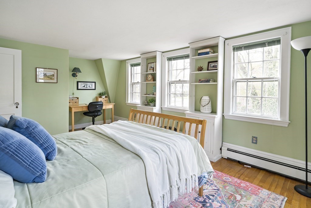 20 Stowell Road Winchester, MA 01890 - Photo 24 of 34 a bedroom with a bed and a window