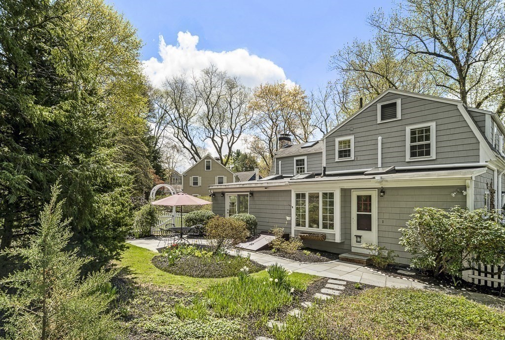 20 Stowell Road Winchester, MA 01890 - Photo 28 of 34 a house view with swimming pool and garden space