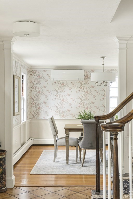 20 Stowell Road Winchester, MA 01890 - Photo 6 of 34 a view of a hallway with furniture and wooden floor