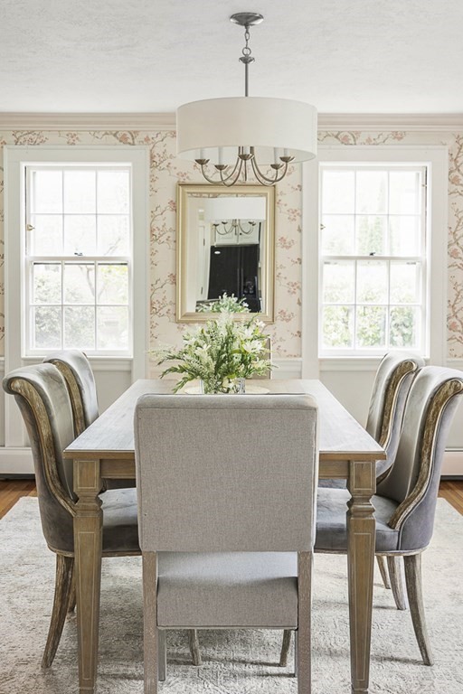 20 Stowell Road Winchester, MA 01890 - Photo 8 of 34 a living room with furniture a fireplace and a large window