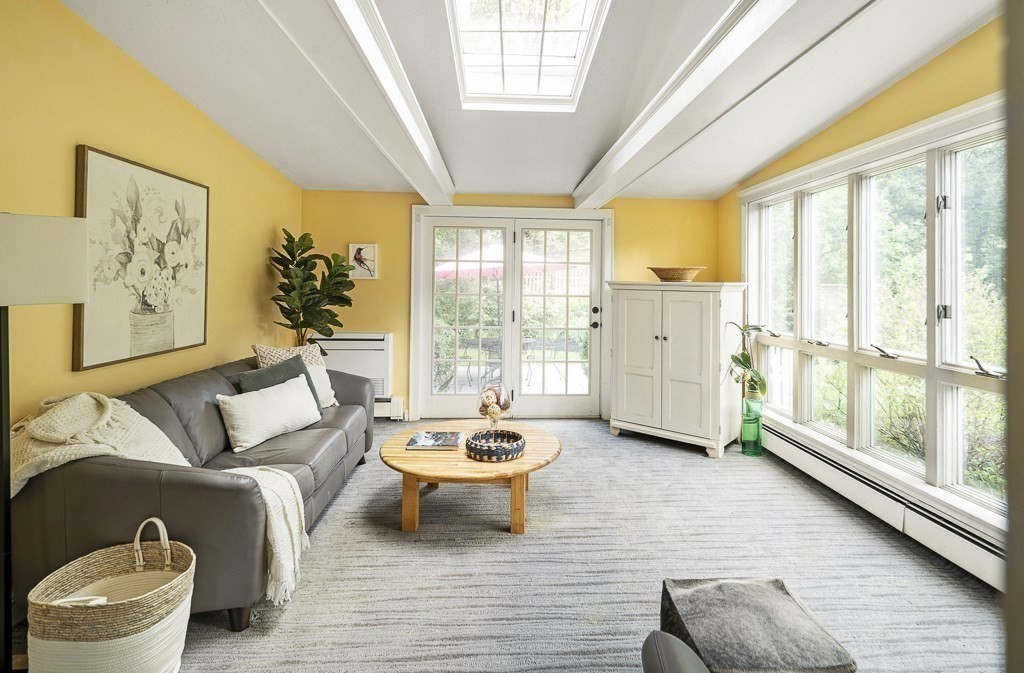 20 Stowell Road Winchester, MA 01890 - Photo 10 of 34 a living room with furniture and large windows