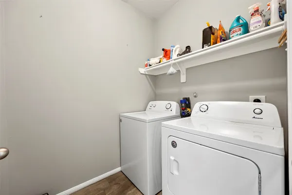 a utility room with dryer and washer