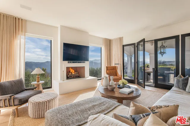 a kitchen with a stove and a refrigerator