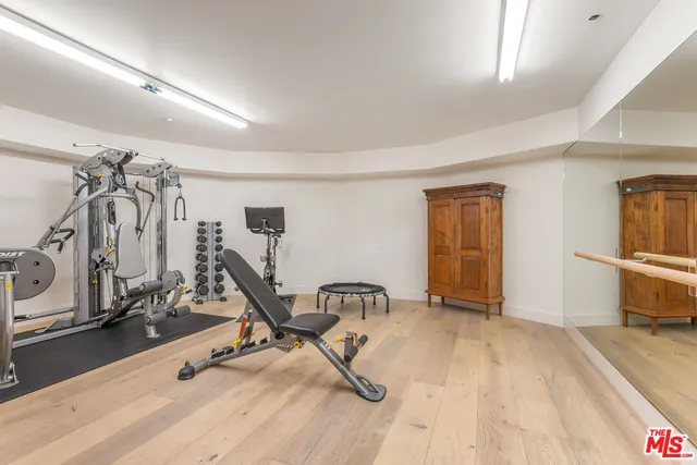 a front view of a residential apartment building with a yard