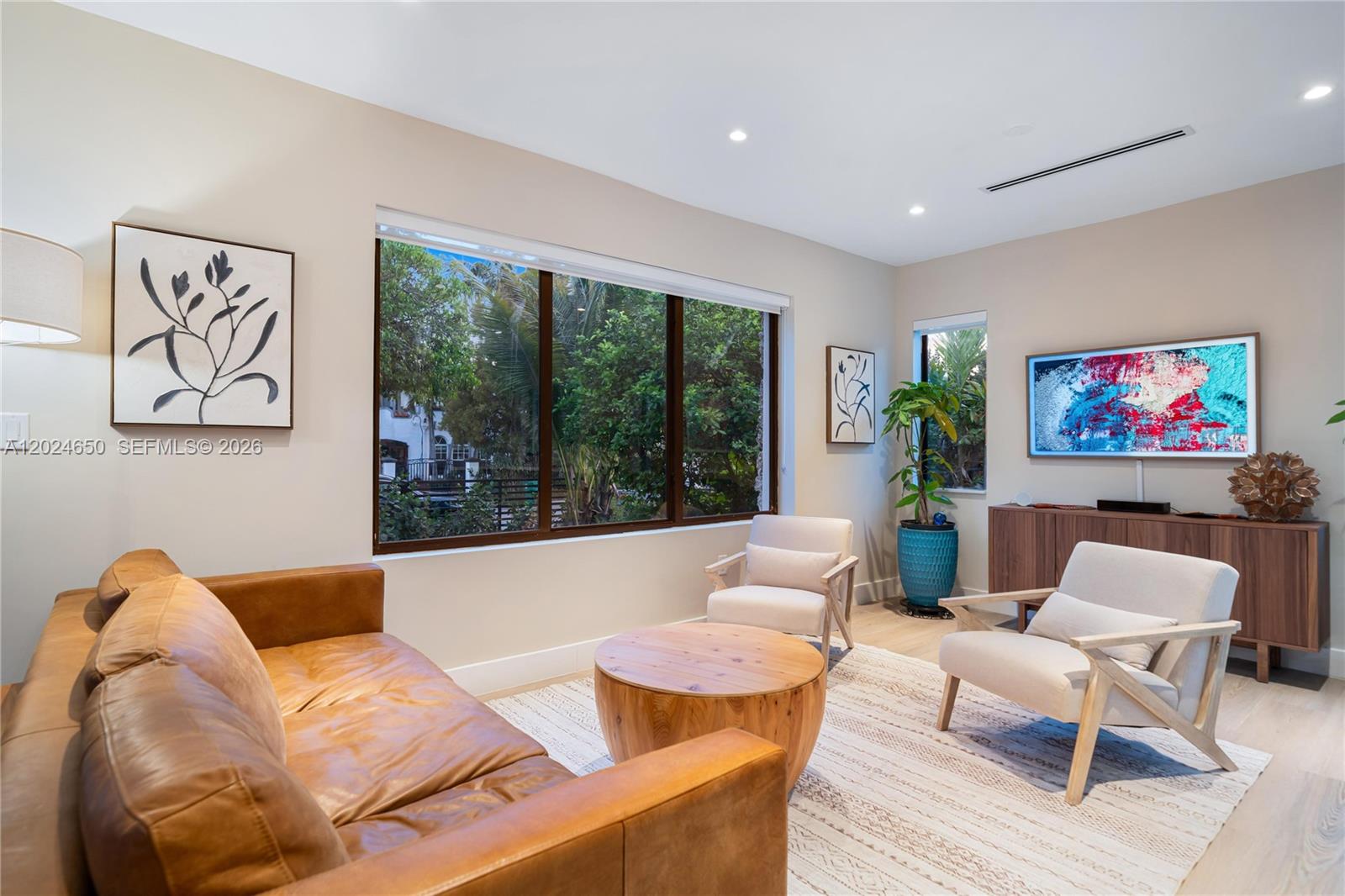 1663 Southwest 13th Street Miami, FL 33145 - Photo 64 of 112 a living room with furniture and a large window