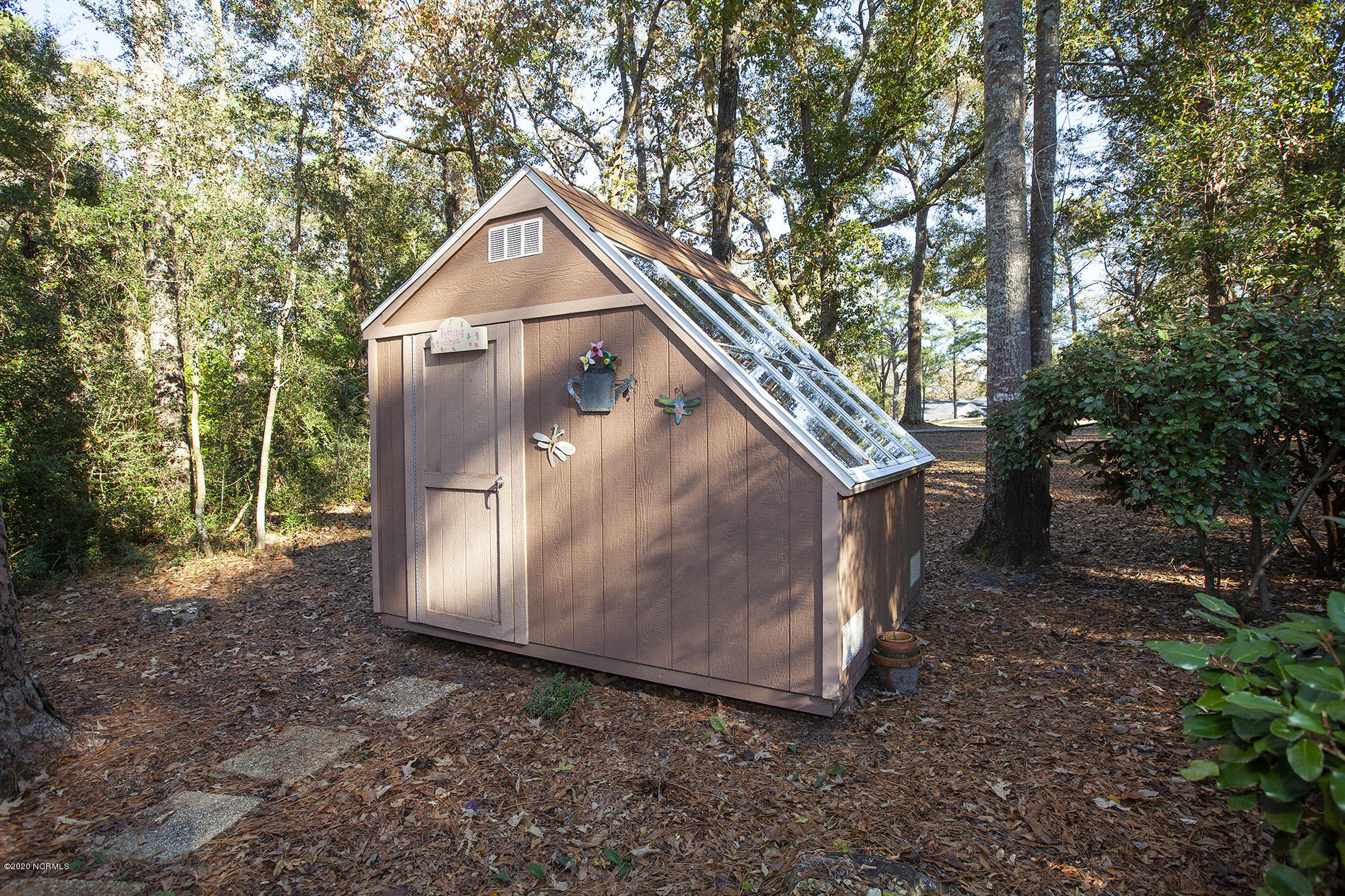 403 Ravenswood Road Hampstead, NC 28443 - Photo 51 of 54 Ravenswood 403 shed Bev_7675