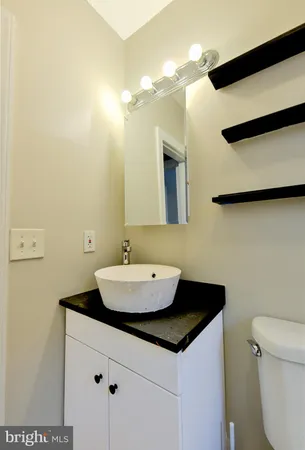 a bathroom with a sink and a toilet