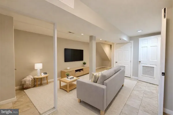 a view of a kitchen with a sink and dishwasher cabinets