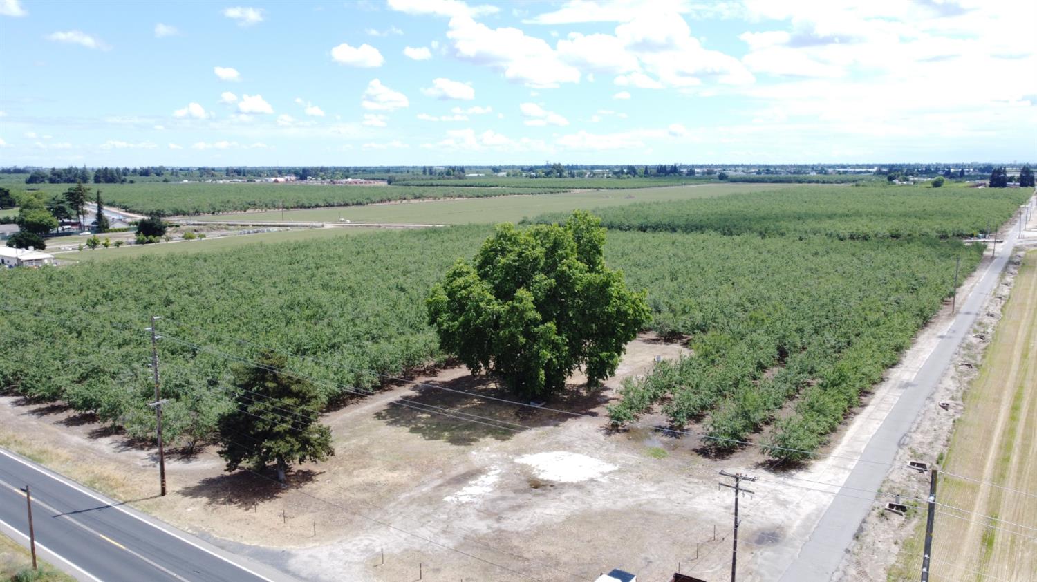 1012 Ladd Road Modesto, CA 95356 - Photo 2 of 8 a view of a lake with a yard
