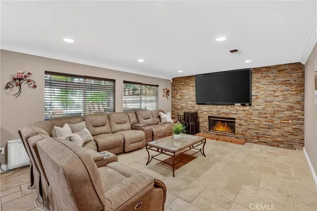 a kitchen with stainless steel appliances a sink stove and cabinets