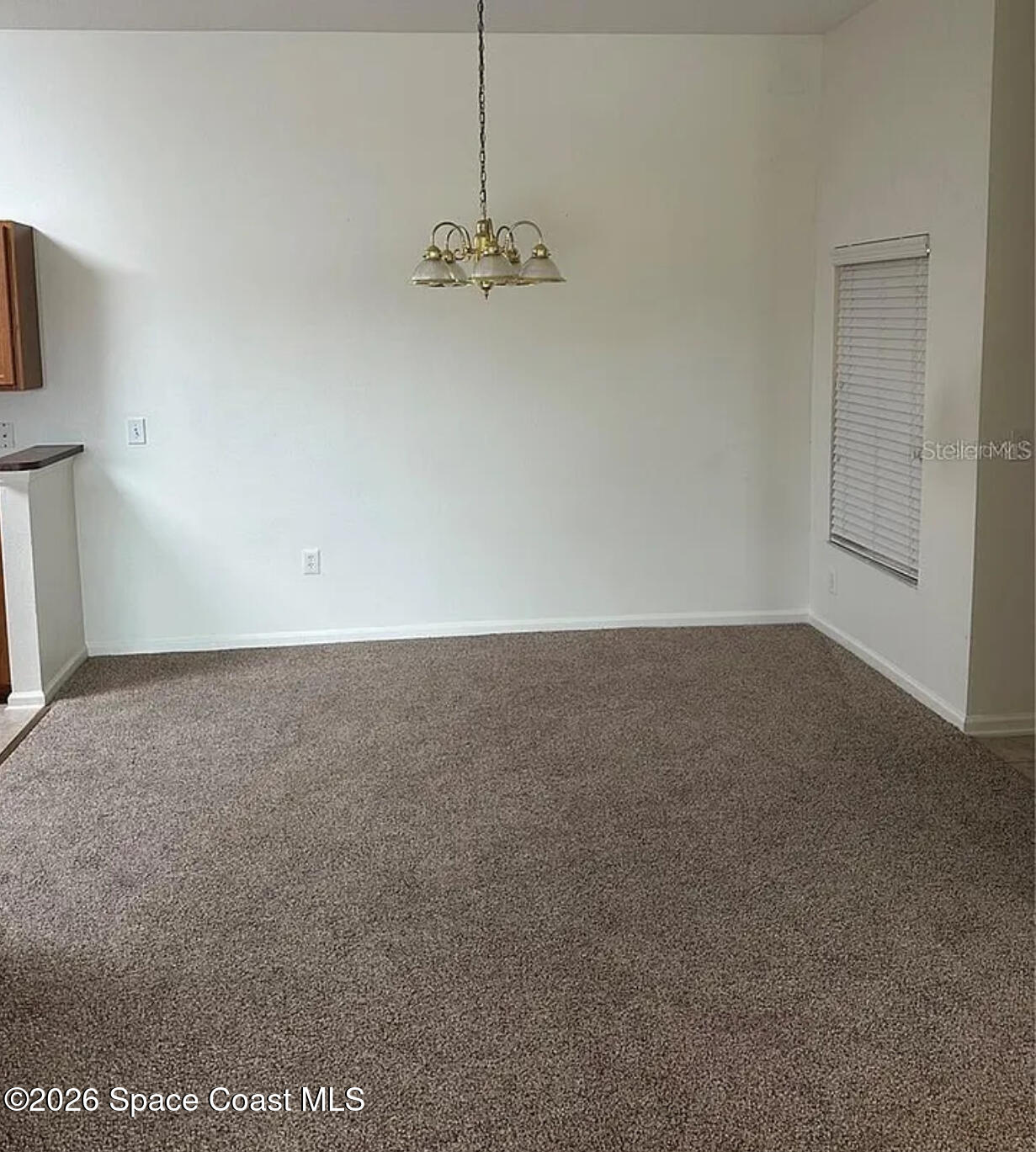 4117 Meander Place, Unit 206 Rockledge, FL 32955 - Photo 6 of 15 a view of a room with an empty space