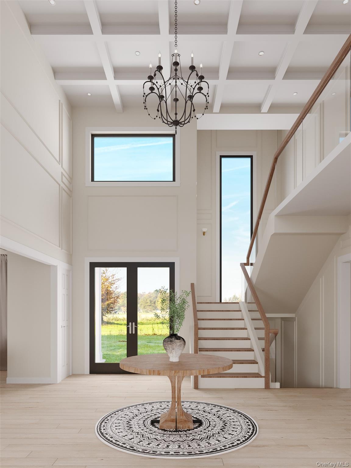 Lot 2-1003 Baldwin Path Dix Hills, NY 11746 - Photo 8 of 20 Rendering - Foyer entrance with a high ceiling, coffered ceiling, an inviting chandelier, french doors, and beam ceiling