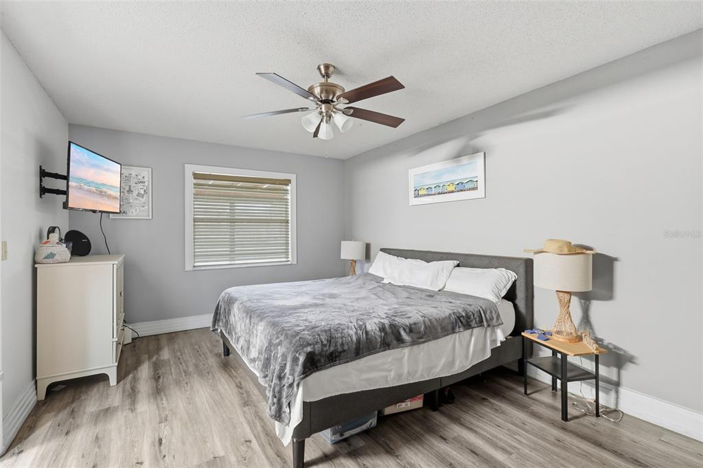 244 Angeles Road DeBary, FL 32713 - Photo 26 of 41 a bedroom with a bed and a window