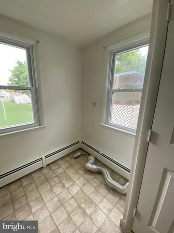 a view of a room with a window