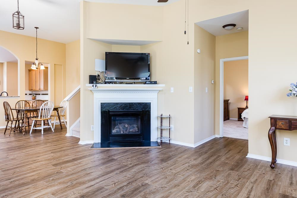 8308 Chimneycap Drive Raleigh, NC 27613 - Photo 9 of 23 Imagine cosy winter days with snow falling softly outside the windows and a warm fire burning on your gas logs! Living Room
