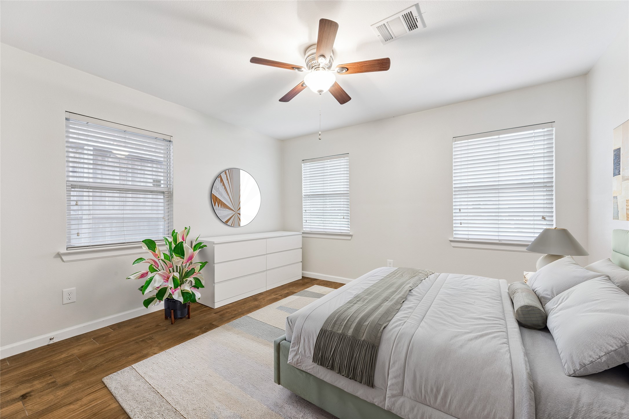 3810 Grennoch Lane Houston, TX 77025 - Photo 11 of 17 a bedroom with a bed mirror and window