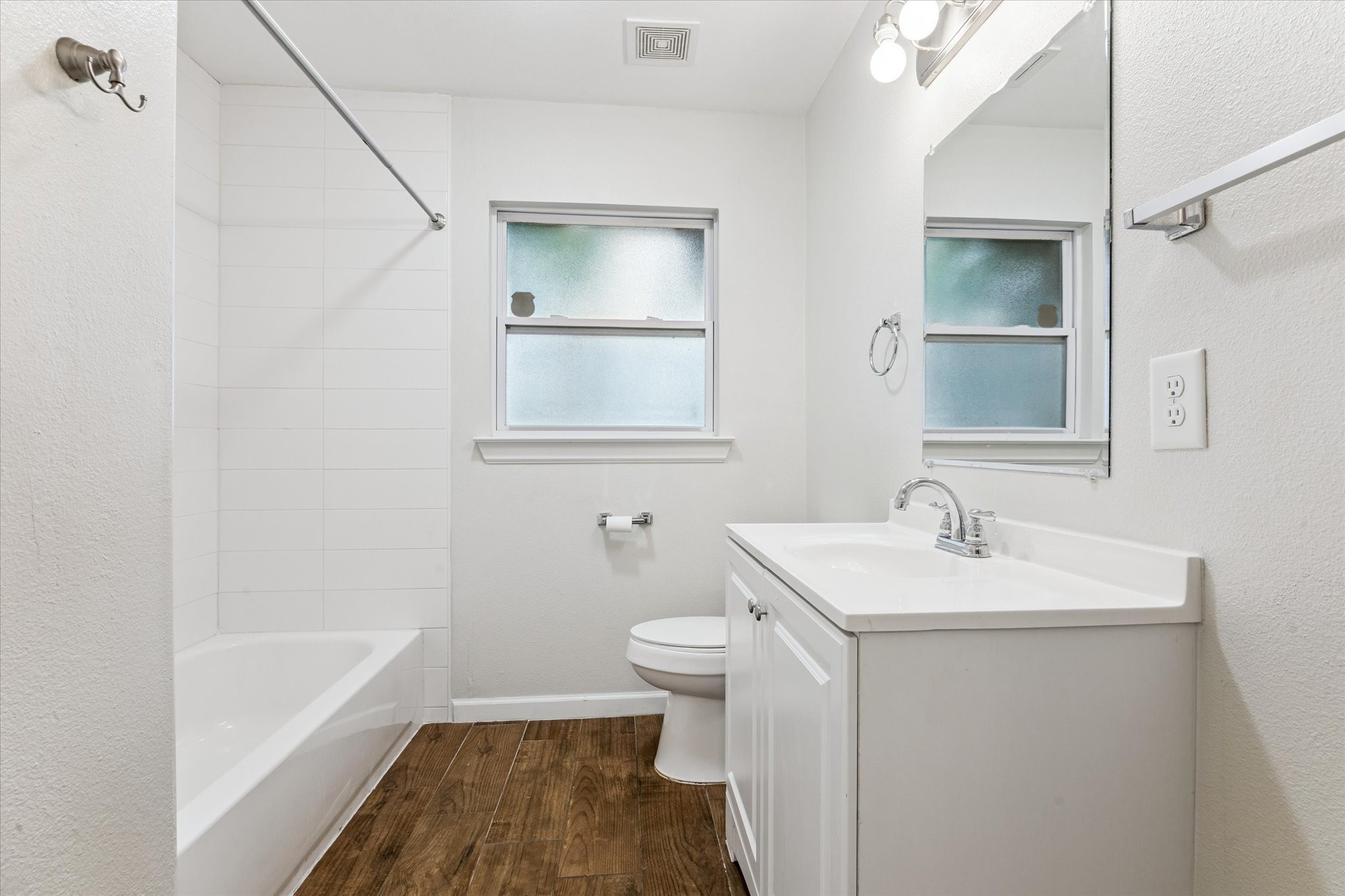 3810 Grennoch Lane Houston, TX 77025 - Photo 13 of 17 a bathroom with a sink a toilet and shower