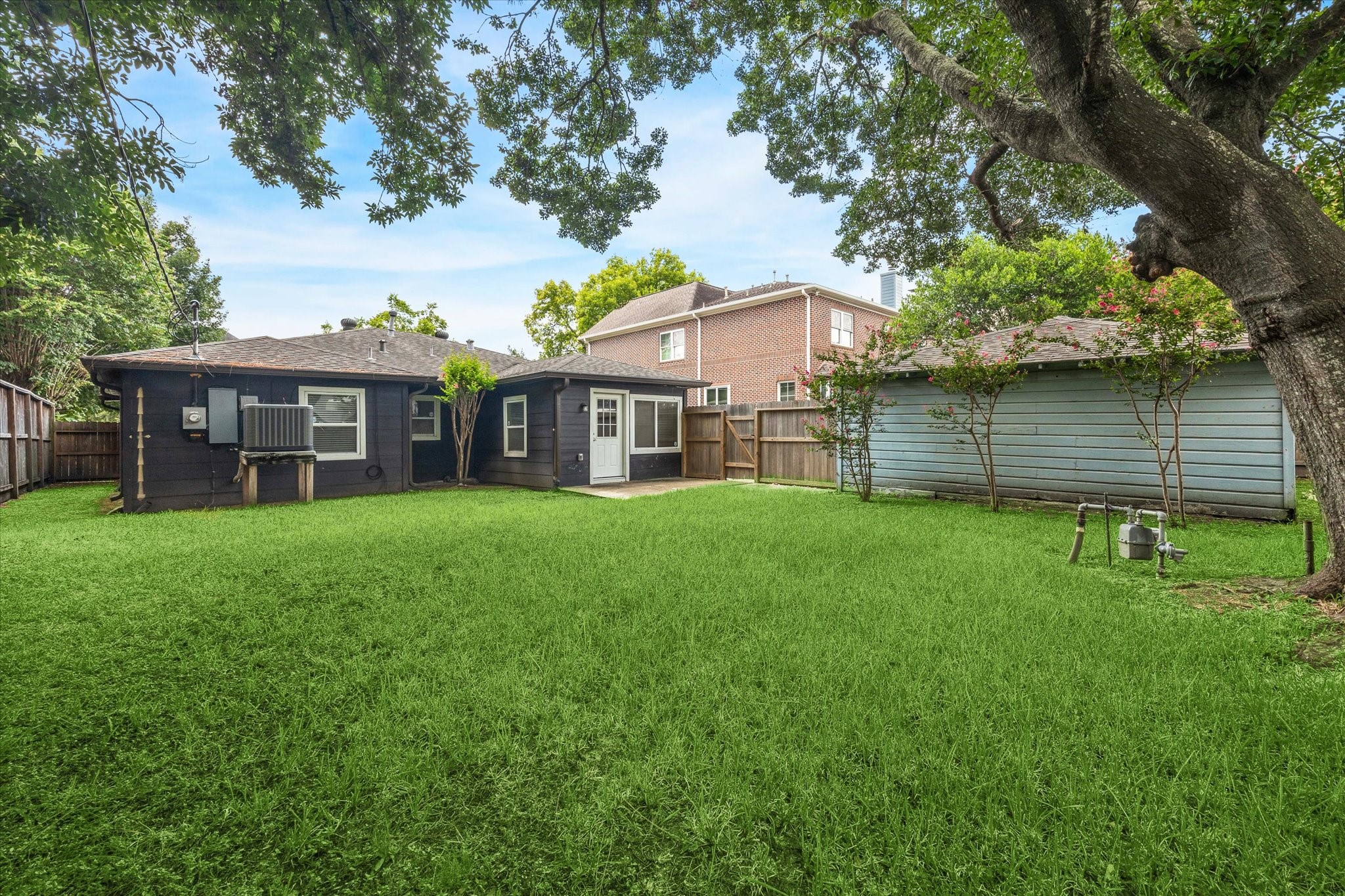 3810 Grennoch Lane Houston, TX 77025 - Photo 14 of 17 a view of a house with a backyard